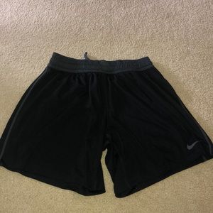 Black and charcoal Nike running shorts